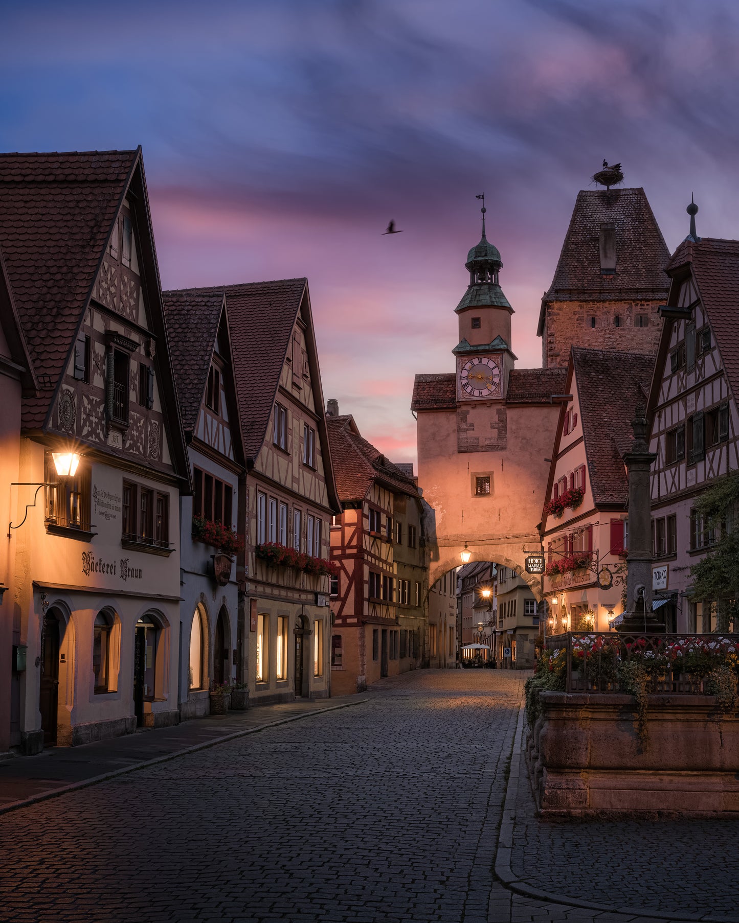 Image Title: Daddy is coming Photographer: Marcus Danz Location: Rothenburg ob der Tauber, Germany Image description: Beautiful sunset view of the Markus Tower n the romantic town of Rothenburg ob der Tauber. High quality Fine Art print up to 36 inch / around 90 centimeters on Hahnemühle paper available.