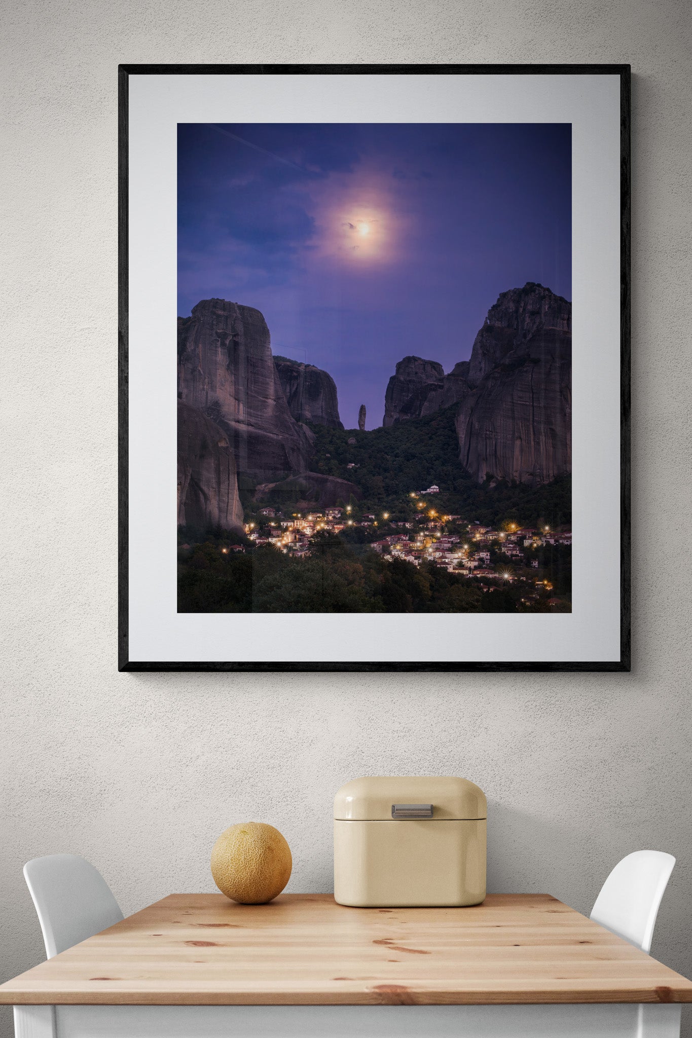Image Title: The Night Watch Photographer: Marcus Danz Location: Kastraki, Greece Image description: Supported by the full moon, an imposing rock needle seems to watch over the Greek village of Kastraki. High quality Fine Art print up to 36 inch / around 90 centimeters on Hahnemühle paper available. Large variant over kitchen table.