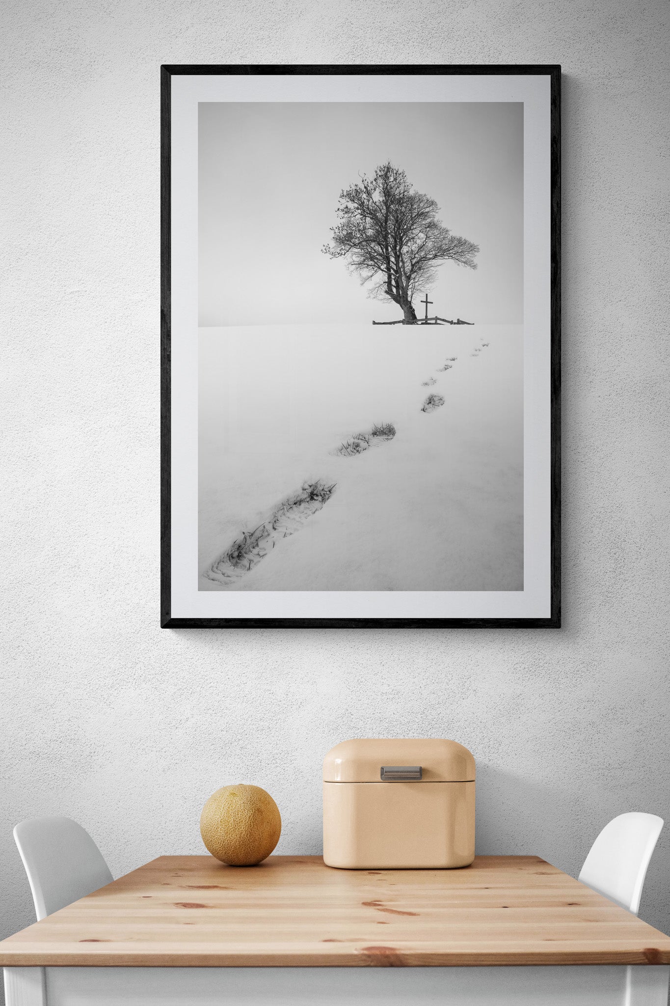 Image Title: The path before you Photographer: Marcus Danz Location: Billerbeck, Germany Image description: Footprints in the snow lead up a hill to a group of trees with a cross. High quality Fine Art print up to 36 inch / around 90 centimeters on Hahnemühle paper available. Large variant over kitchen table.