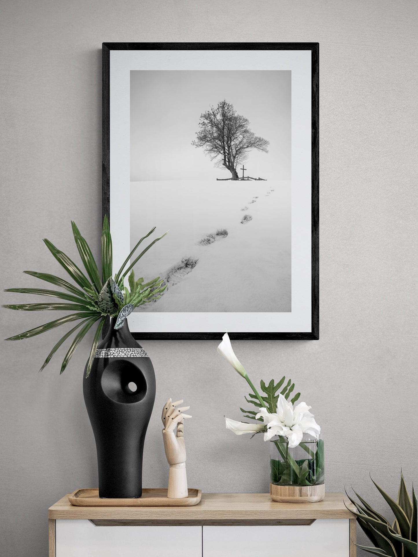 Image Title: The path before you Photographer: Marcus Danz Location: Billerbeck, Germany Image description: Footprints in the snow lead up a hill to a group of trees with a cross. High quality Fine Art print up to 36 inch / around 90 centimeters on Hahnemühle paper available. Medium variant over sideboard.