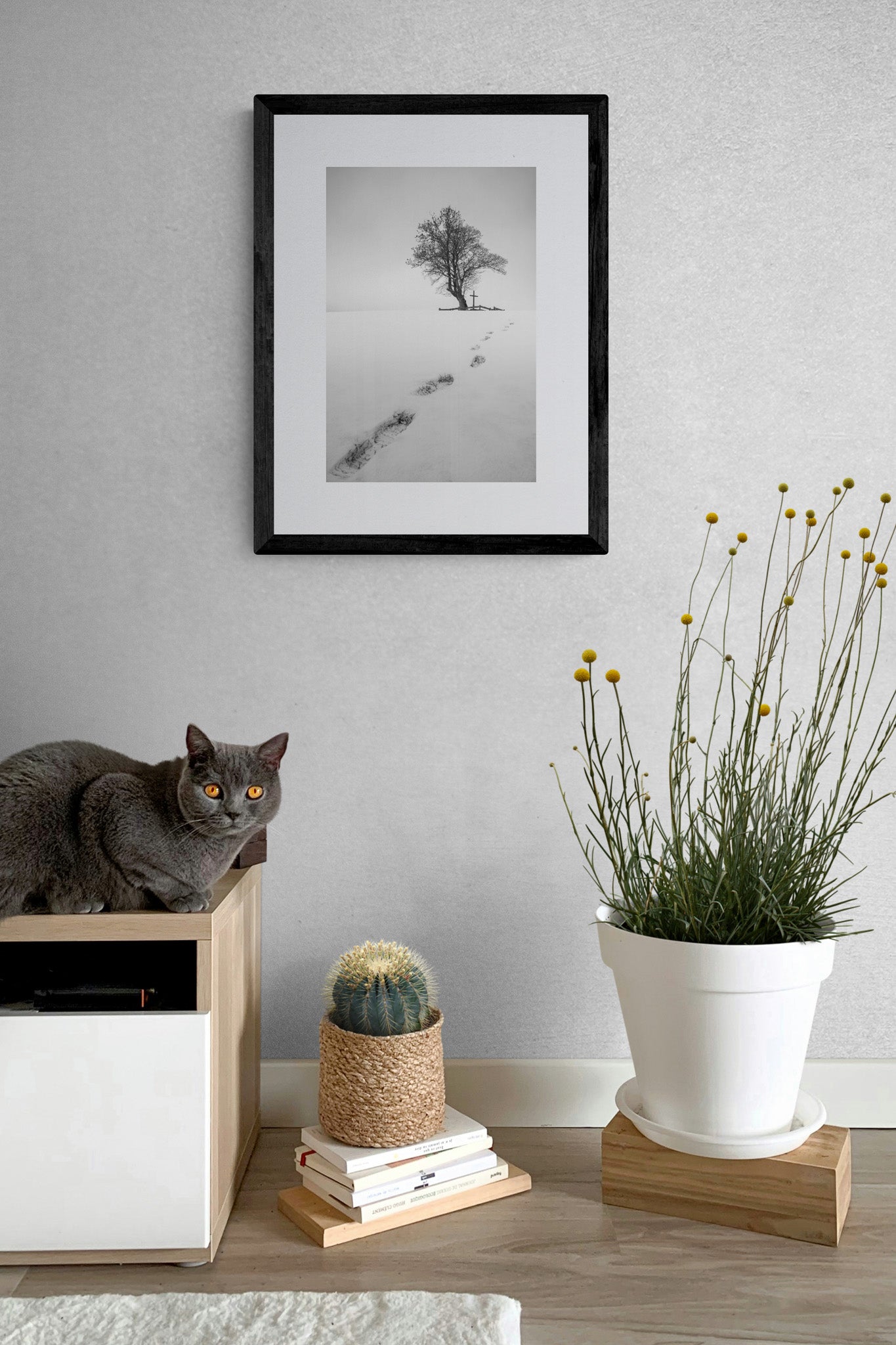 Image Title: The path before you Photographer: Marcus Danz Location: Billerbeck, Germany Image description: Footprints in the snow lead up a hill to a group of trees with a cross. High quality Fine Art print up to 36 inch / around 90 centimeters on Hahnemühle paper available. Small variant in living room.