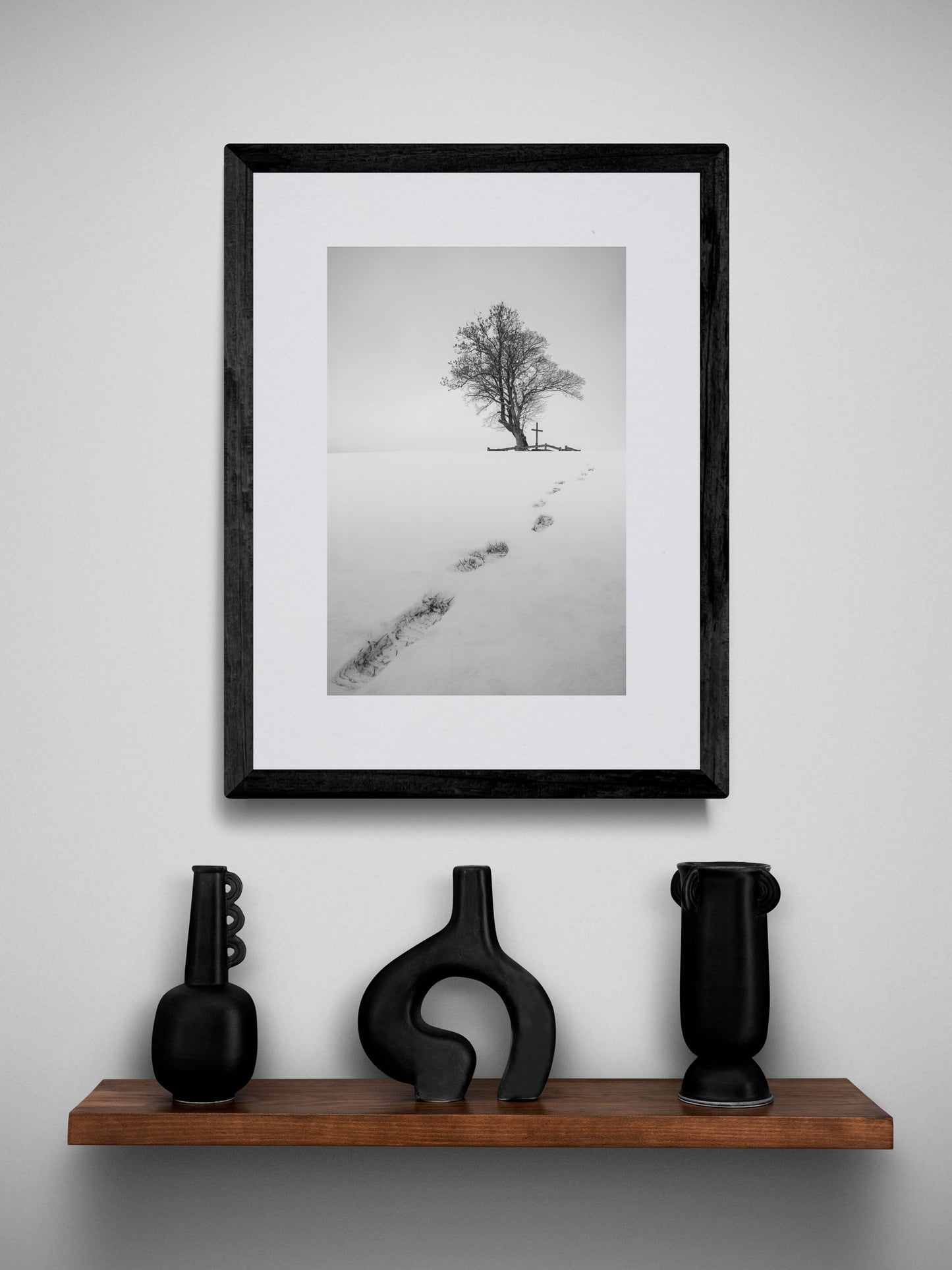Image Title: The path before you Photographer: Marcus Danz Location: Billerbeck, Germany Image description: Footprints in the snow lead up a hill to a group of trees with a cross. High quality Fine Art print up to 36 inch / around 90 centimeters on Hahnemühle paper available. Small variant over shelf.