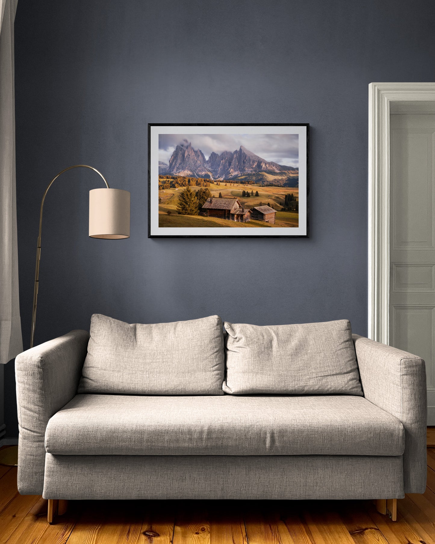 Image Title: A Tyrol Tidbit Photographer: Marcus Danz Location: Alpe di Siusi, Italy Image description: While increasingly dense clouds pass by the peaks of the mighty Sassolungo group, the pasture catches the warm light of the soon-to-set sun one more time. High quality Fine Art print up to 36 inch / around 90 centimeters on Hahnemühle paper available. Large variant in living room.