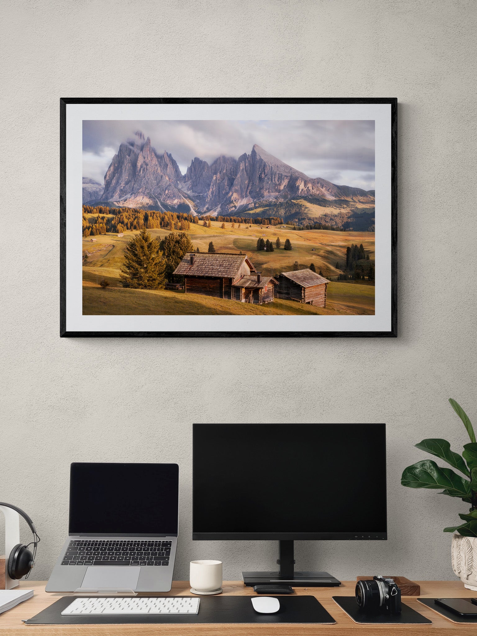 Image Title: A Tyrol Tidbit Photographer: Marcus Danz Location: Alpe di Siusi, Italy Image description: While increasingly dense clouds pass by the peaks of the mighty Sassolungo group, the pasture catches the warm light of the soon-to-set sun one more time. High quality Fine Art print up to 36 inch / around 90 centimeters on Hahnemühle paper available. Large variant over computer desk.