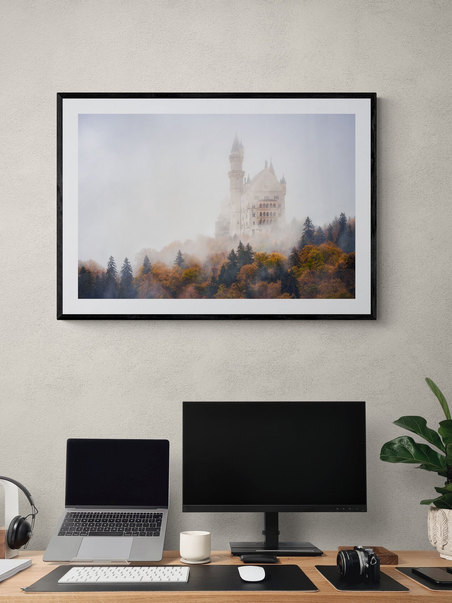 Image Title: Autumn under Neuschwanstein Photographer: Marcus Danz Location: Schwangau, Germany Image description: Shrouded in mist, Neuschwanstein Castle towers majestically above the autumnly colored woods. High quality Fine Art print up to 36 inch / around 90 centimeters on Hahnemühle paper available. Large variant over computer desk.