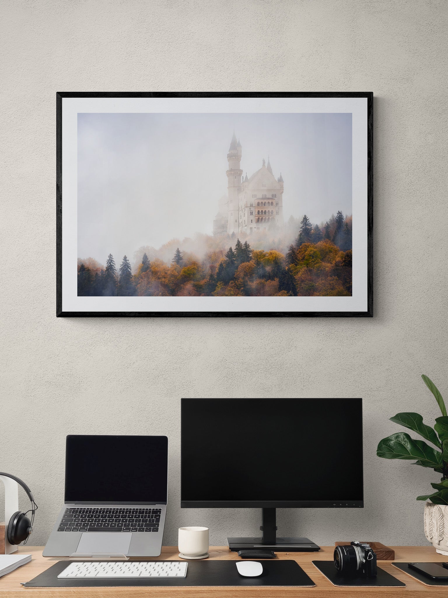 Image Title: Autumn under Neuschwanstein Photographer: Marcus Danz Location: Schwangau, Germany Image description: Shrouded in mist, Neuschwanstein Castle towers majestically above the autumnly colored woods. High quality Fine Art print up to 36 inch / around 90 centimeters on Hahnemühle paper available. Large variant over computer desk.
