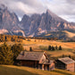 Image Title: A Tyrol Tidbit Photographer: Marcus Danz Location: Alpe di Siusi, Italy Image description: While increasingly dense clouds pass by the peaks of the mighty Sassolungo group, the pasture catches the warm light of the soon-to-set sun one more time. High quality Fine Art print up to 36 inch / around 90 centimeters on Hahnemühle paper available.
