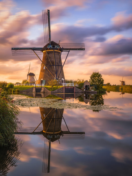 Image Title: Golden Irony Photographer: Marcus Danz Location: Kinderdijk, Netherlands Image description: The iconic windmills in Kinderdijk (Netherlands) present themselves in the warm light of the sunset. High quality Fine Art print up to 36 inch / around 90 centimeters on Hahnemühle paper available.