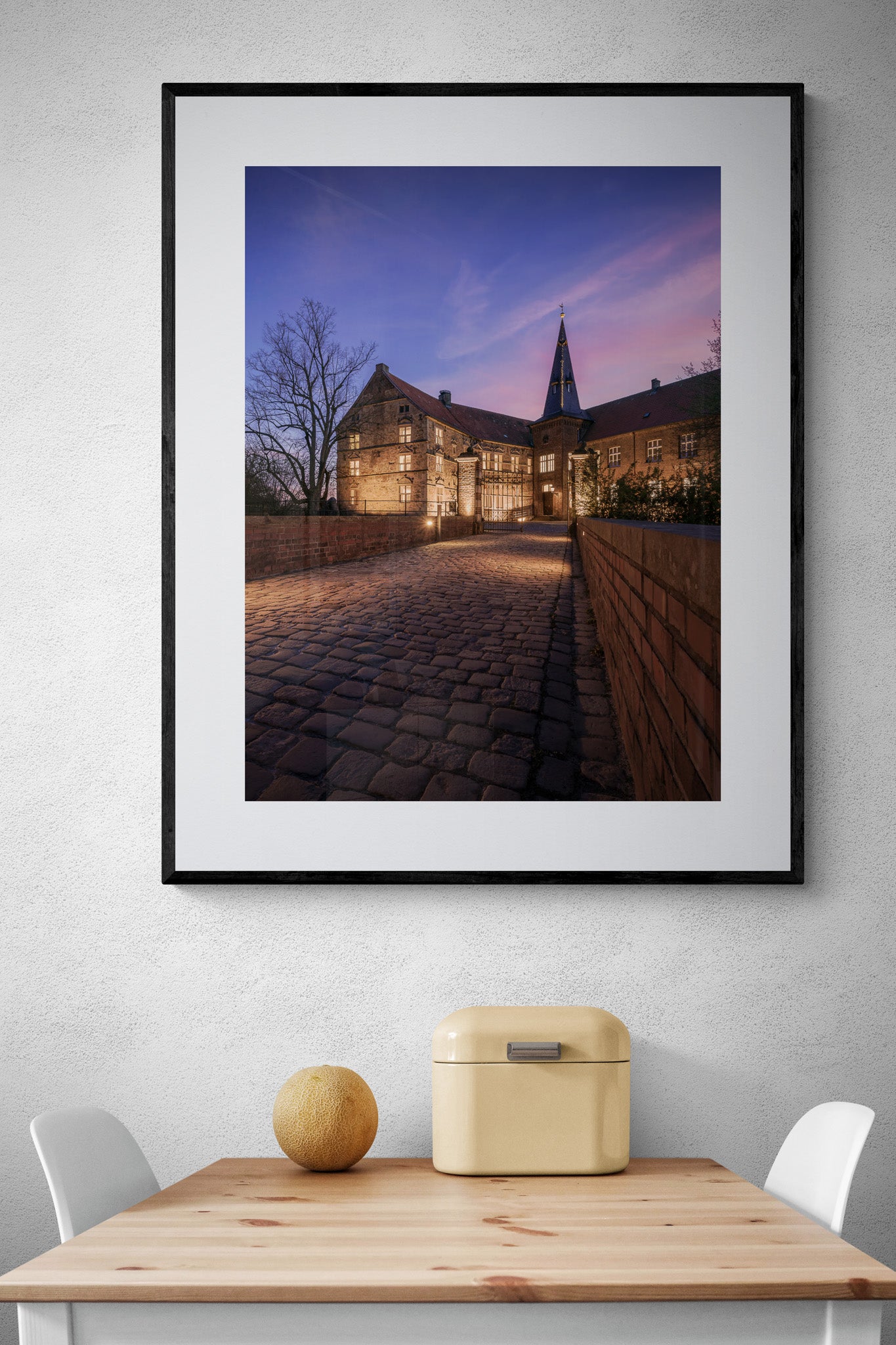 Image Title: Light the Castle Photographer: Marcus Danz Location: Lüdinghausen, Germany Image description: Lüdinghausen Castle is beautifully illuminated on this mild spring evening. High quality Fine Art print up to 36 inch / around 90 centimeters on Hahnemühle paper available. Large variant over kitchen table.