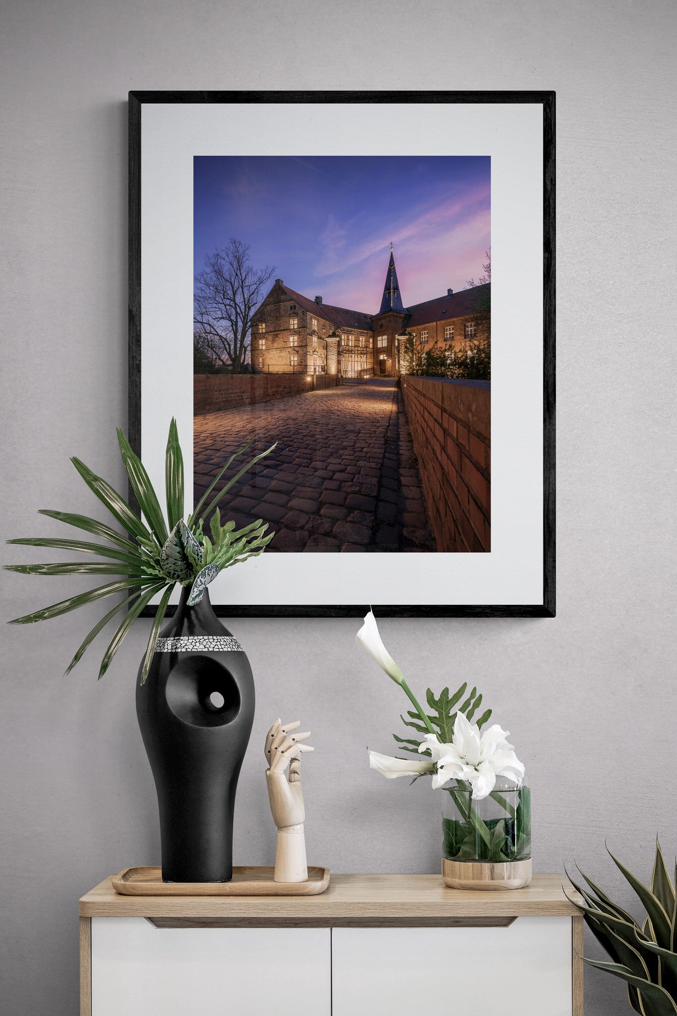 Image Title: Light the Castle Photographer: Marcus Danz Location: Lüdinghausen, Germany Image description: Lüdinghausen Castle is beautifully illuminated on this mild spring evening. High quality Fine Art print up to 36 inch / around 90 centimeters on Hahnemühle paper available. Medium variant over sideboard.