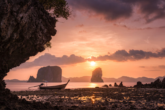 Image Title: Low Tide at Sunset Photographer: Marcus Danz Location: Ko Phak Bia, Thailand  Image description: A wonderful view of Thailand's breathtaking coastal landscape and a longtail boat at sunset. High quality Fine Art print up to 36 inch / around 90 centimeters on Hahnemühle paper available.