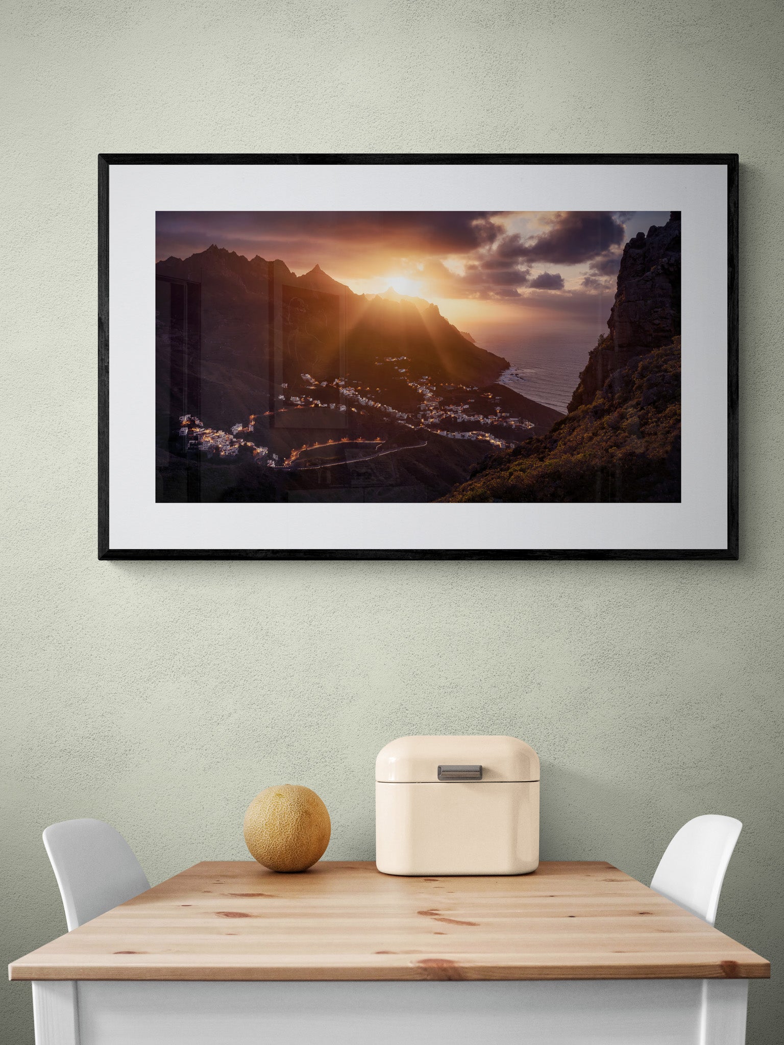 Image Title: The Taganana Twist Photographer: Marcus Danz Location: Tenerife, Spain Image description: Accompanied by the spectacular sunset at the peaks of the Anaga Mountains, the lights of the village of Taganana come to life. High quality Fine Art print up to 36 inch / around 90 centimeters on Hahnemühle paper available. Large variant over kitchen table.