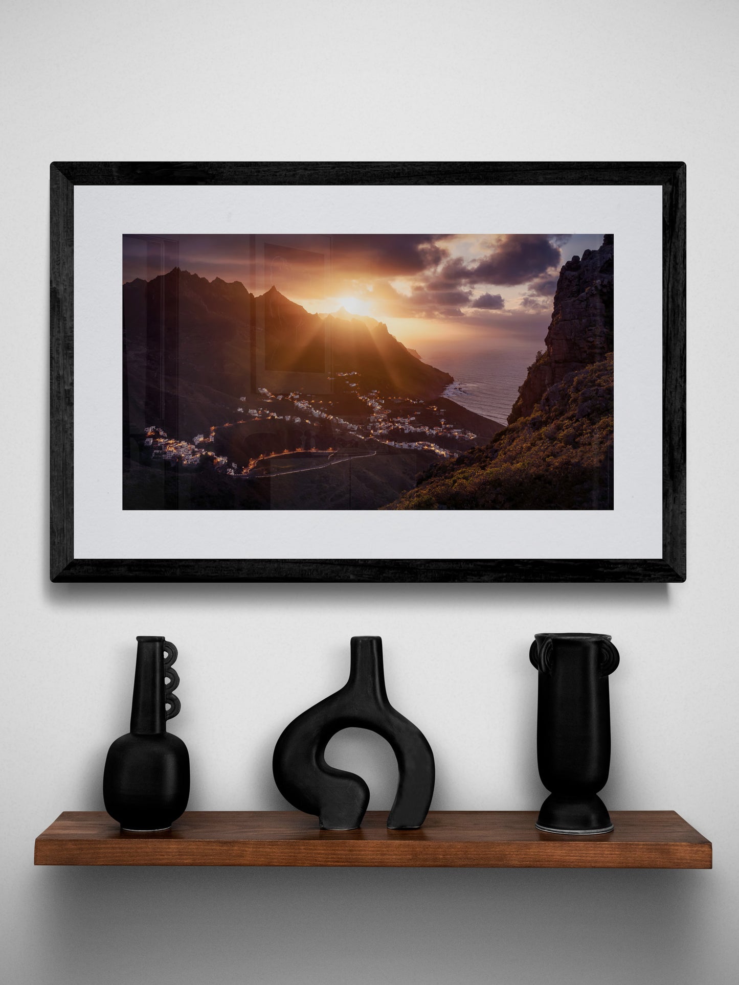 Image Title: The Taganana Twist Photographer: Marcus Danz Location: Tenerife, Spain Image description: Accompanied by the spectacular sunset at the peaks of the Anaga Mountains, the lights of the village of Taganana come to life. High quality Fine Art print up to 36 inch / around 90 centimeters on Hahnemühle paper available. Small variant over shelf.